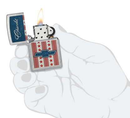 Zippo Chevrolet® Stars and Stripes Design Street Chrome Windproof Lighter lit in hand.