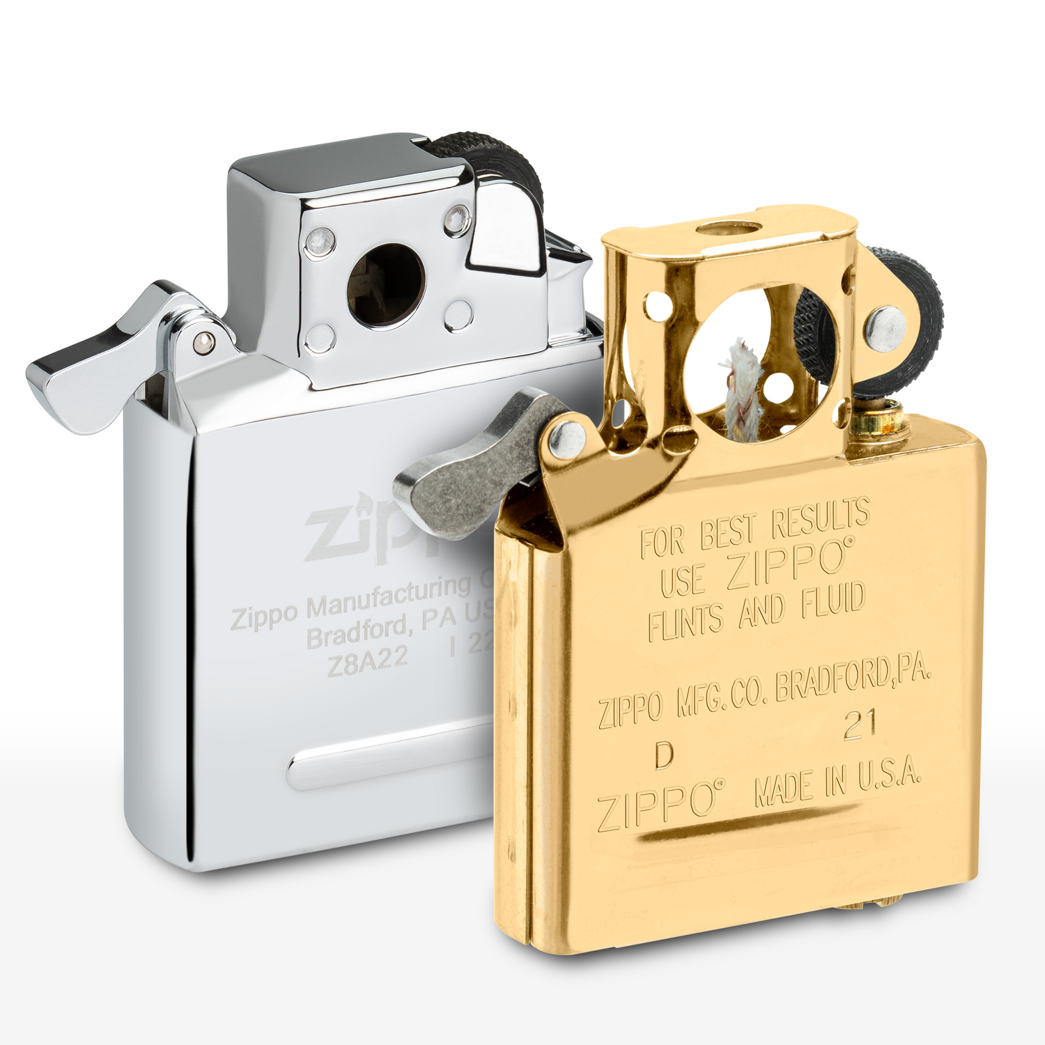 Silver and gold Zippo pipe lighter inserts on a white background
