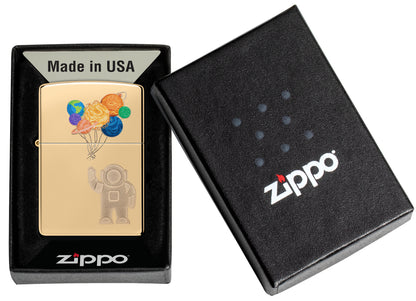 Zippo Liftoff Design High Polish Brass Windproof Lighter in its packaging.
