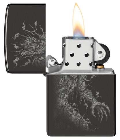 Zippo Root of All Evil Design High Polish Black Windproof Lighter with its lid open and lit.