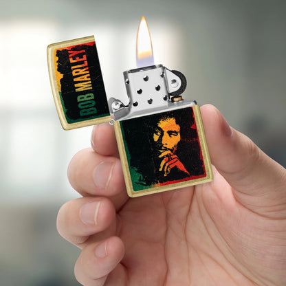 Zippo Bob Marley Portrait Design Street Brass Windproof Lighter lit in hand.