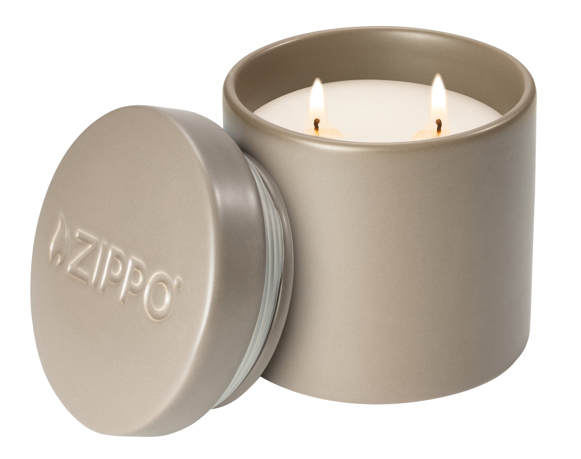 Front view of Zippo FlameScapes™ Citronella, Spearmint and Lemongrass Essential Oil Outdoor Candle lit with the lid leaning against the candle.