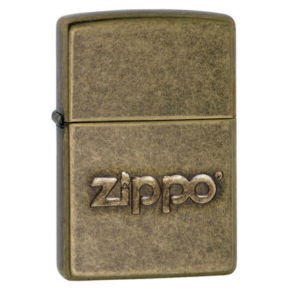 Front shot of Zippo Stamp Antique Brass Lighter standing at a 3/4 angle.