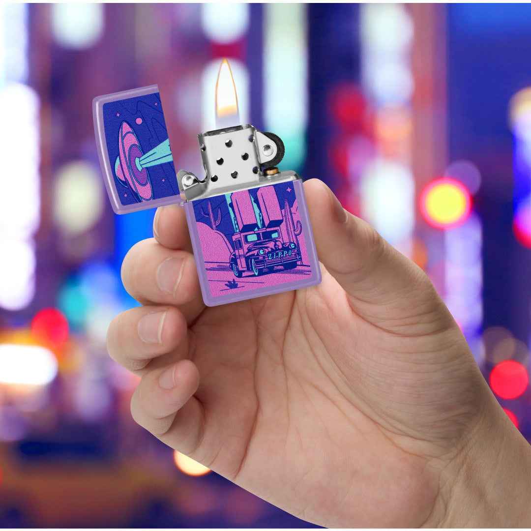 Zippo Car Chase Design Smoky Lavender Windproof Lighter lit in hand.