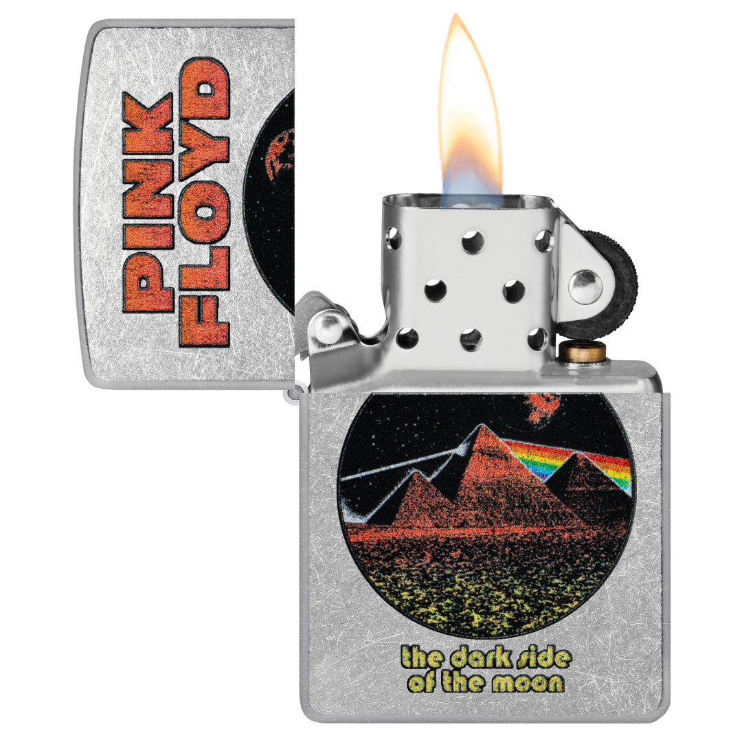 Zippo Pink Floyd Pyramids Design Street Chrome Windproof Lighter with its lid open and lit.