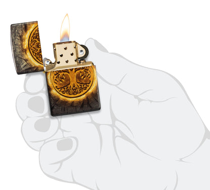 Zippo Gleaming Tree of Life Design 540 Tumbled Brass Windproof Lighter lit in hand.