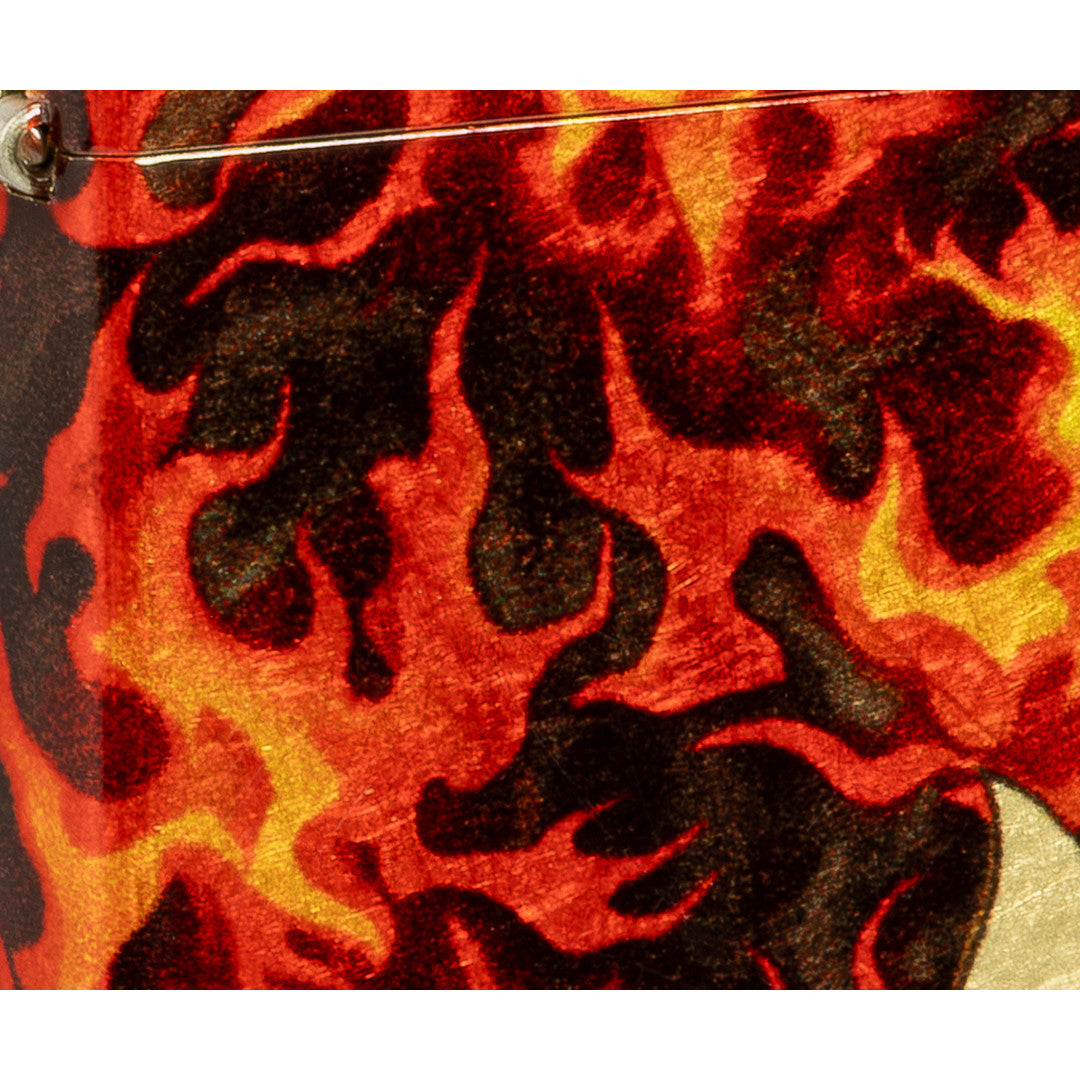 Front view of Zippo Inferno Design 540 Matte Windproof Lighter close up to show the detail of the lighter.