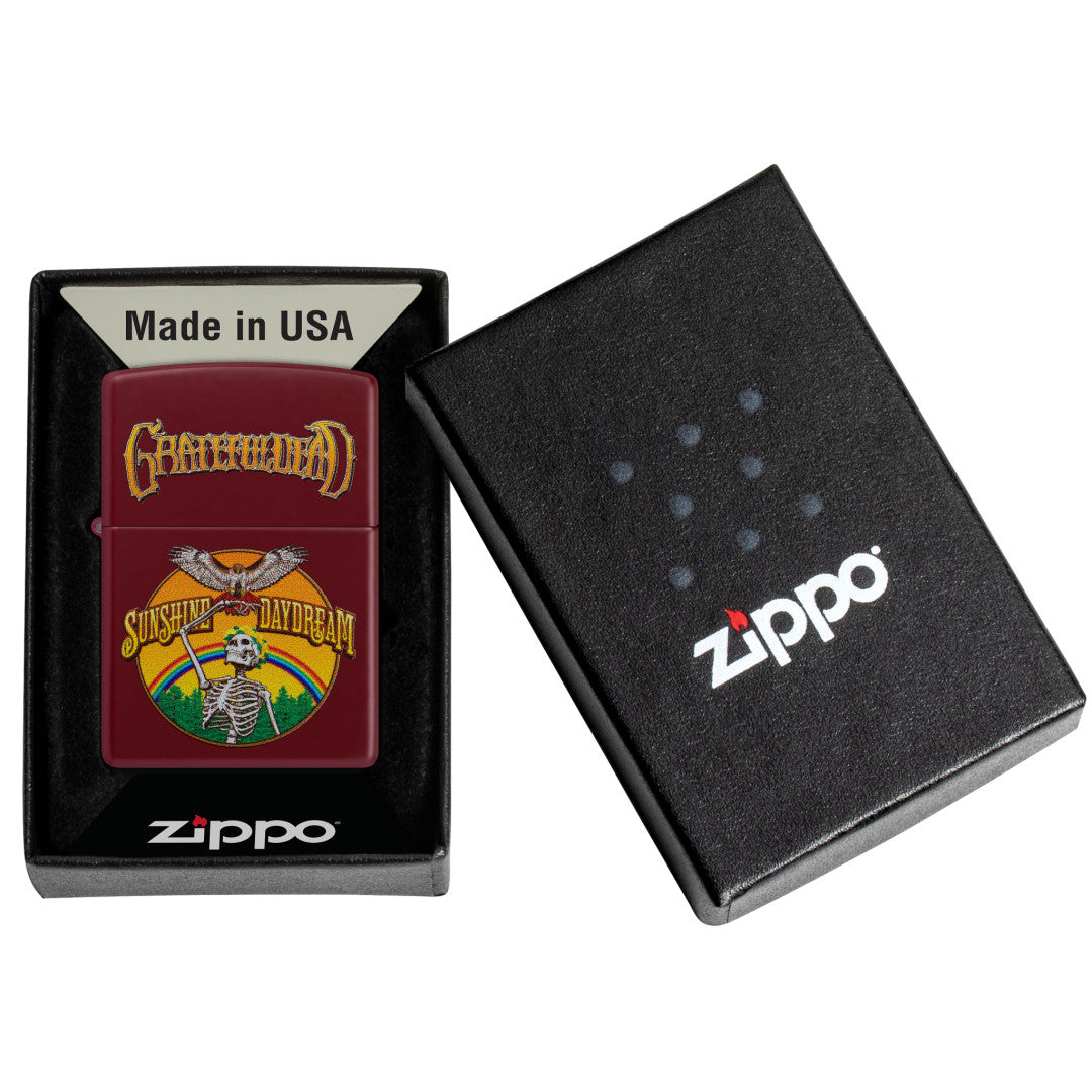 Zippo Grateful Dead Sunshine Daydream Design Merlot Windproof Lighter in its packaging.