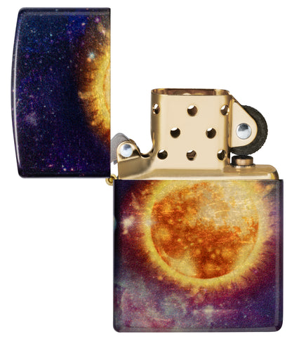 Zippo Solar Flare Design 540 Tumbled Brass Windproof lighter with its lid open and lit.