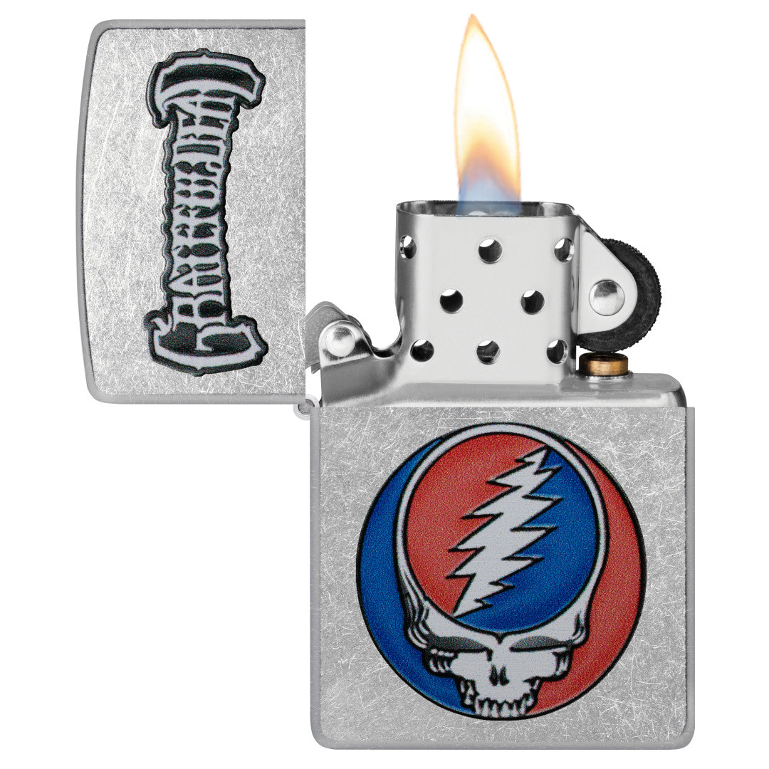 Zippo Grateful Dead Steal Your Face Design Street Chrome Windproof Lighter with its lid open and lit.