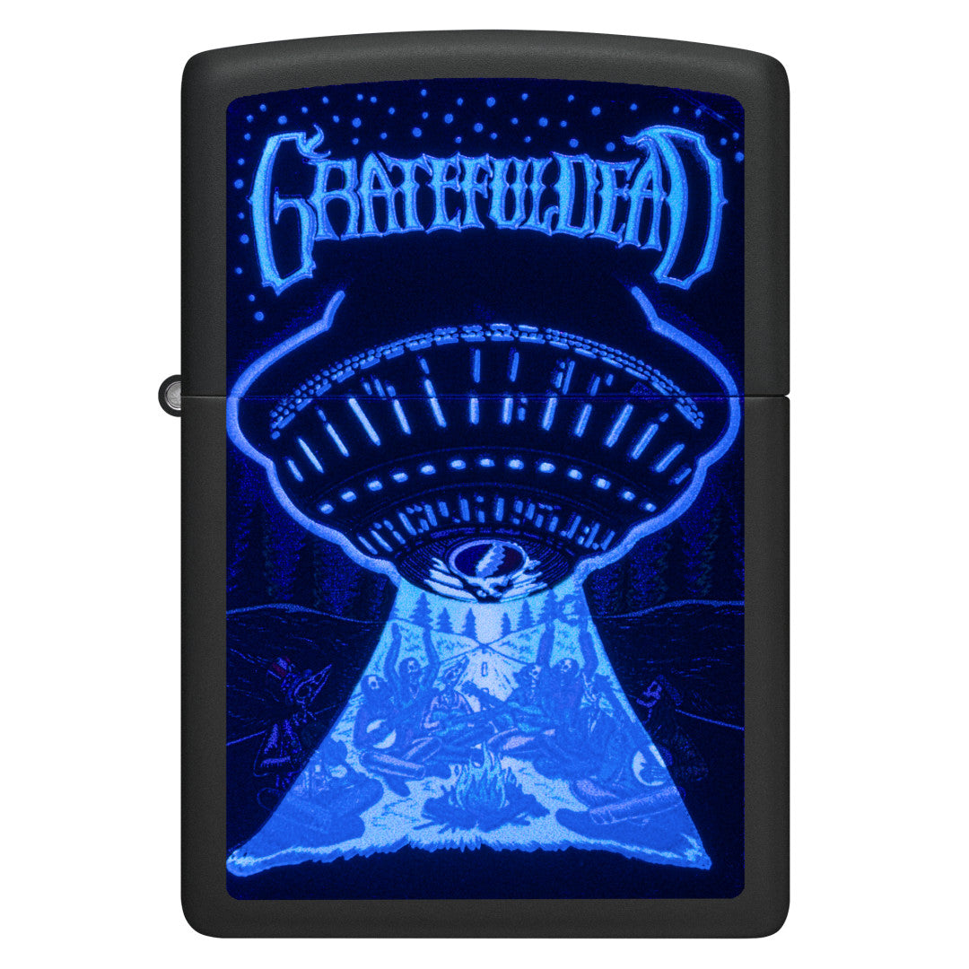 Front view of Zippo Grateful Dead Black Light UFO Design Black Matte Windproof Lighter glowing under a black light.