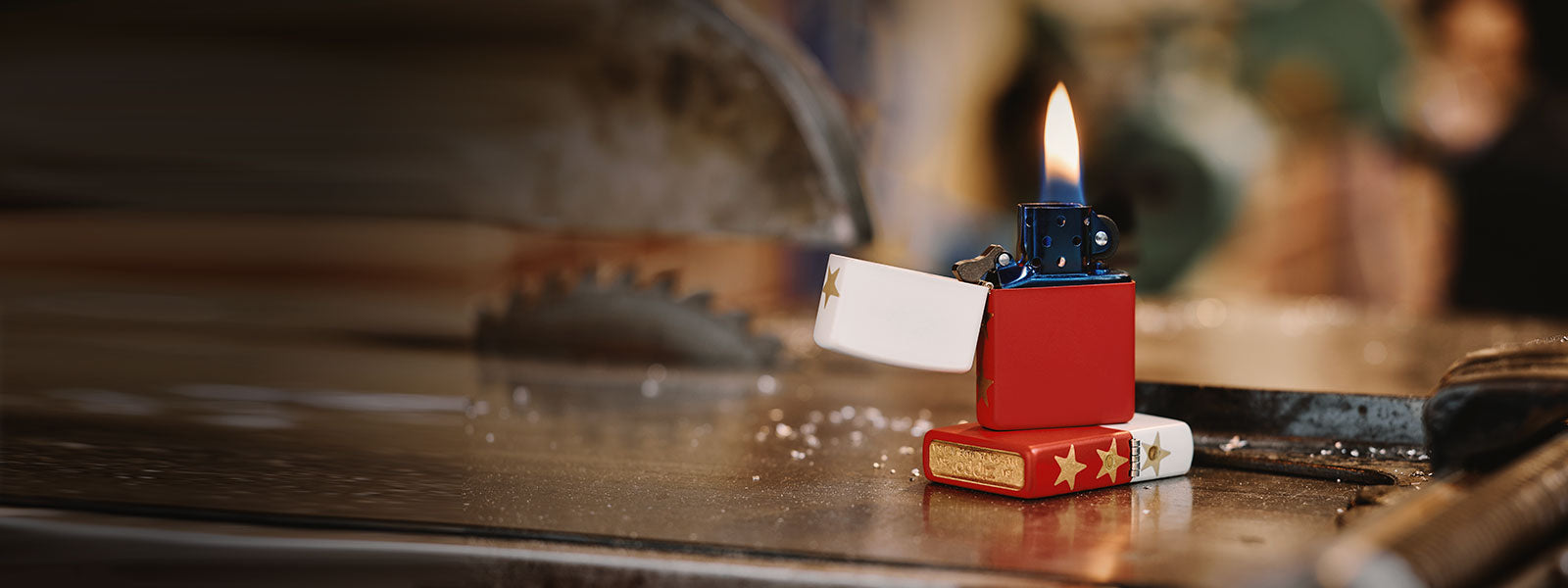 America's 250th Special Edition Lighter on a workbench with a table saw.
