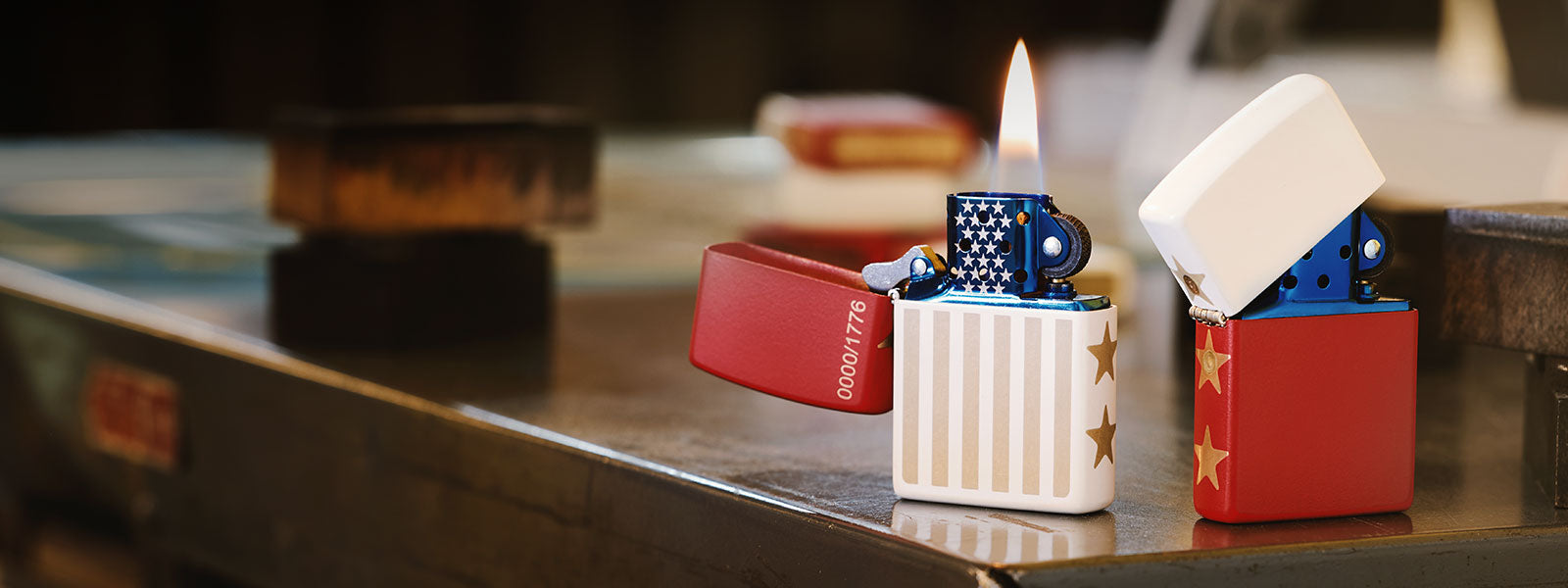 Zippo America 250th lighters on a workbench.