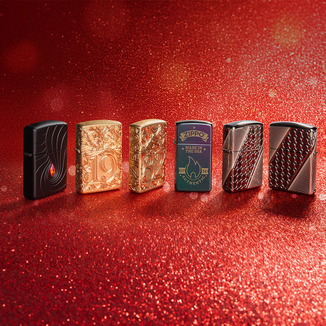 Six Zippo lighters of different designs on a red glittery background