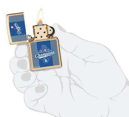 2025 World Series™ Champions - Los Angeles Dodgers™ Commemorative Lighter lit in hand.