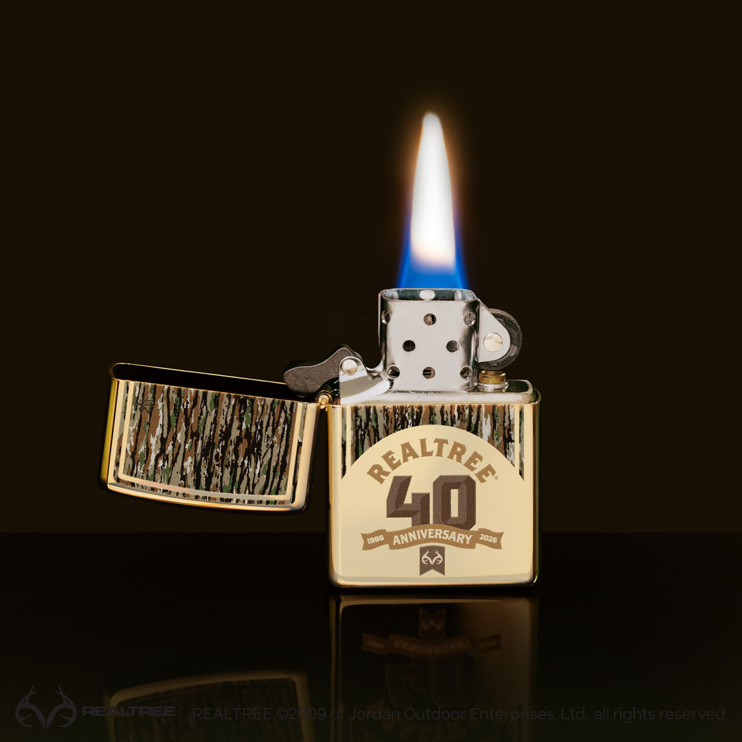 Realtree 40th Anniversary lighter with a brown background.
