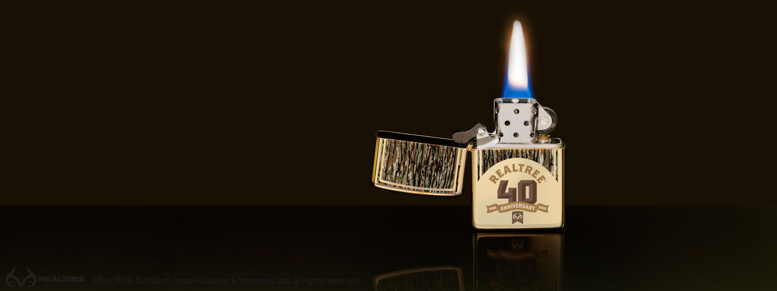 Realtree 40th Anniversary lighter with a brown background.