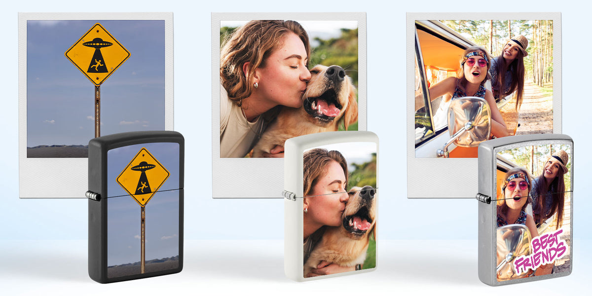 Four custom photo lighters displayed on a light blue gradient background, each featuring a different printed design including a road sign, a woman kissing a dog, two women in a car, and a group of friends with the text 'BEST FRIENDS'.