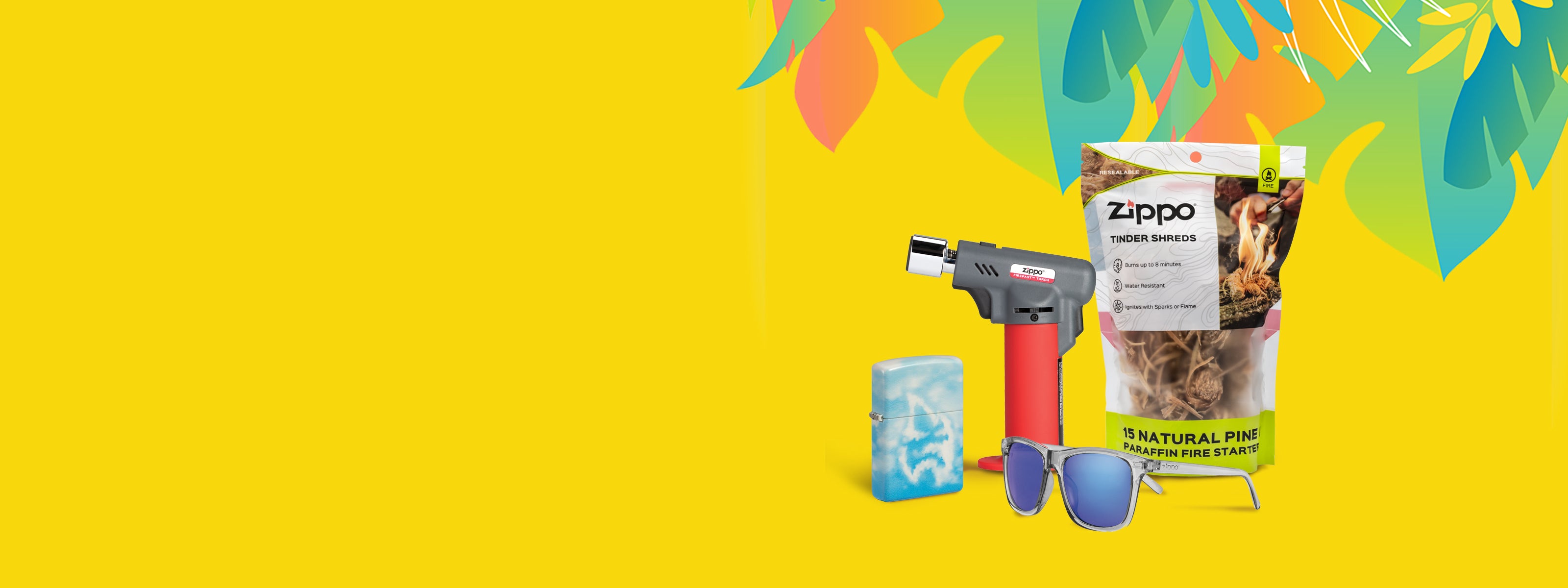 Zippo lighter, tinder shreds, Fire Fast Torch and sunglasses on a yellow background with colorful leaves.