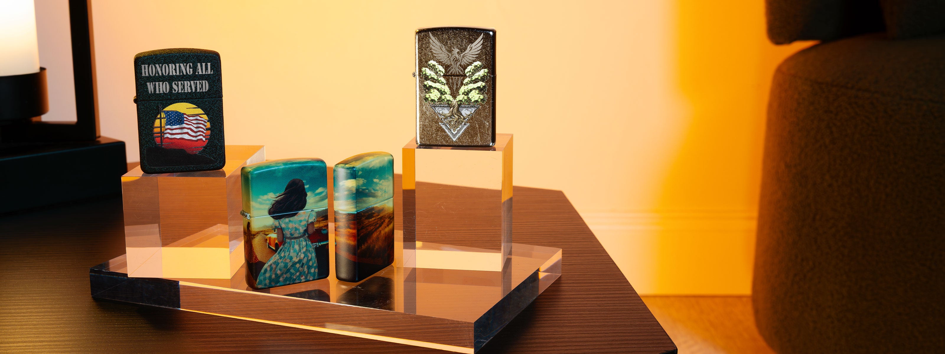 Three new lighters on a wood display stand.