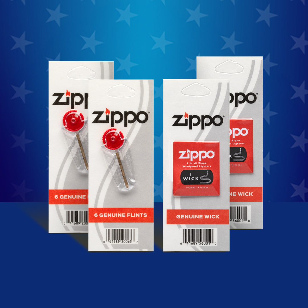 Four Zippo flints and wicks on a blue background with star patterns.