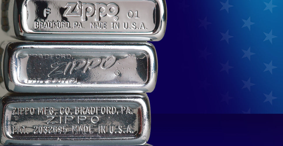 Three Zippo lighters stacked on a blue background 