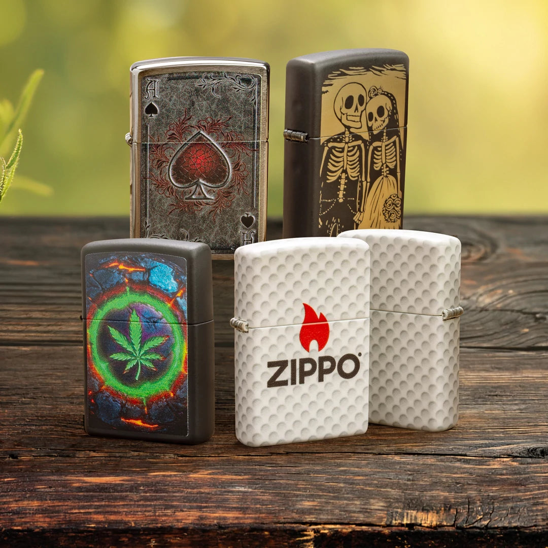Five 2026 Spring Supplement Zippo lighters on a wooden surface with a green background. 