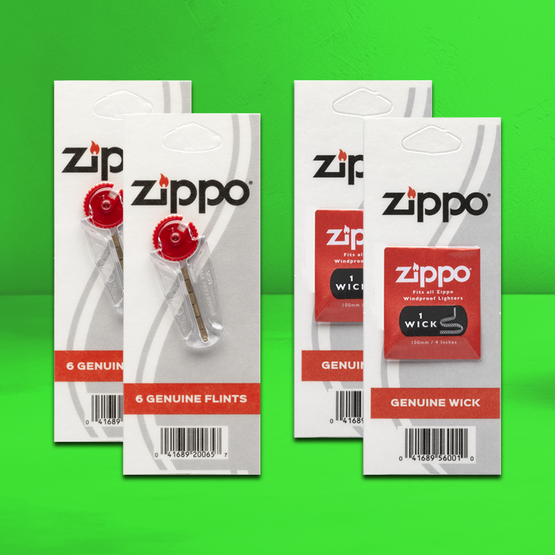 Zippo brand packaging for flints and wicks on a green background.