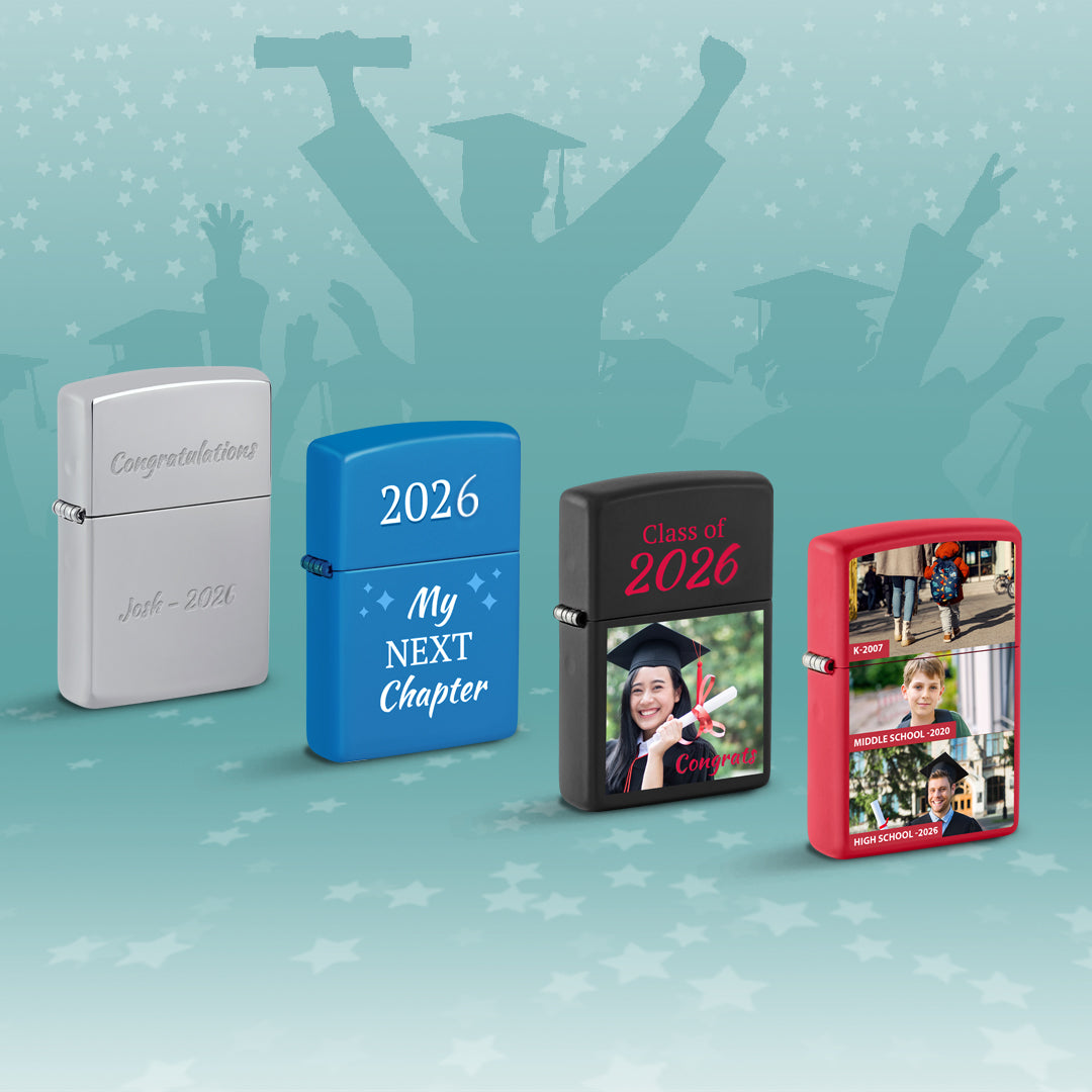 Four graduation themed Zippo lighters in front of a blue background. 
