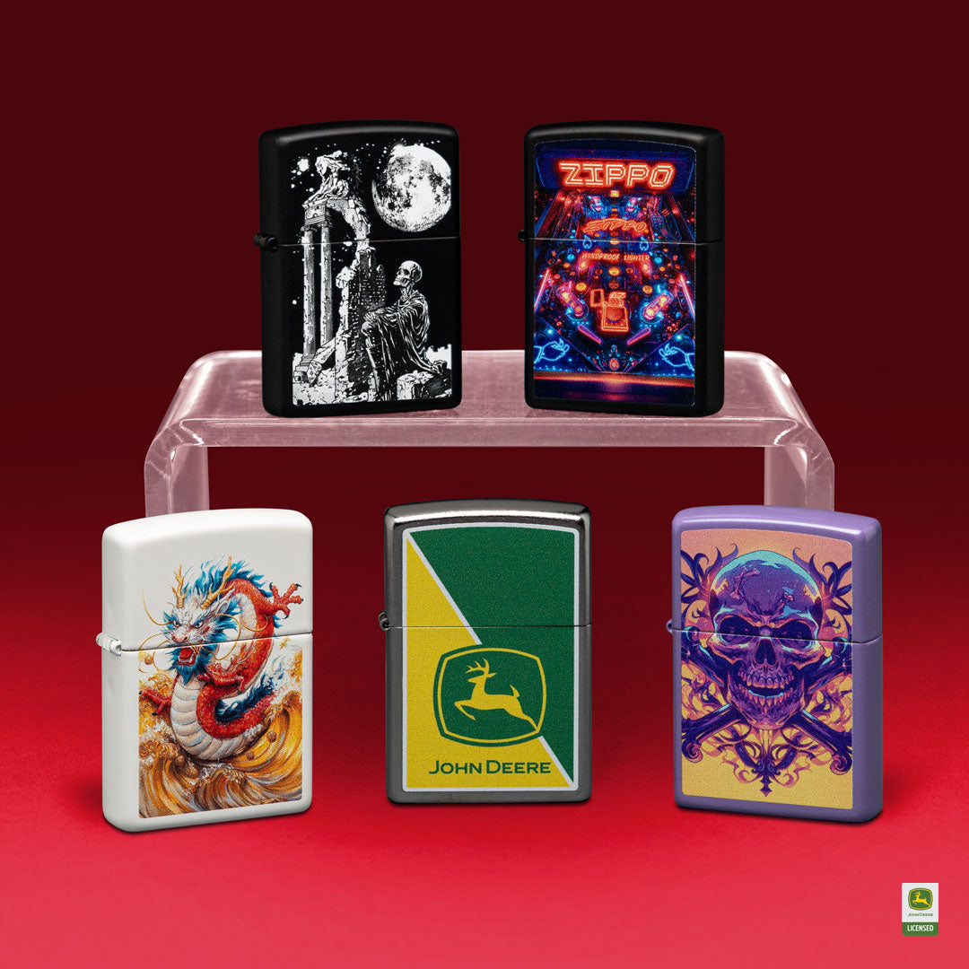 Five Zippo lighters with various designs on a red background