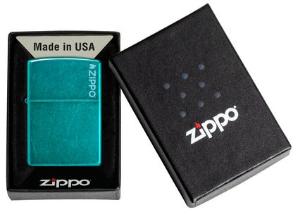 Zippo Classic Candy Teal Zippo Logo Windproof Lighter in its packaging.