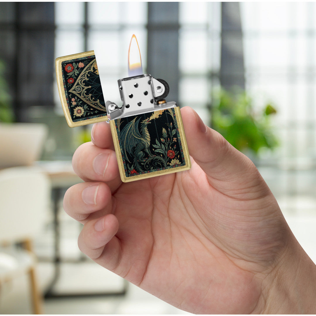 Zippo Dragon Tapestry Design Street Brass Windproof Lighter lit in hand.