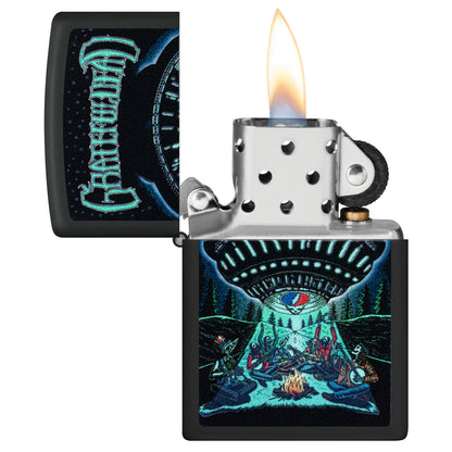 Zippo Grateful Dead Black Light UFO Design Black Matte Windproof Lighter with its lid open and lit.