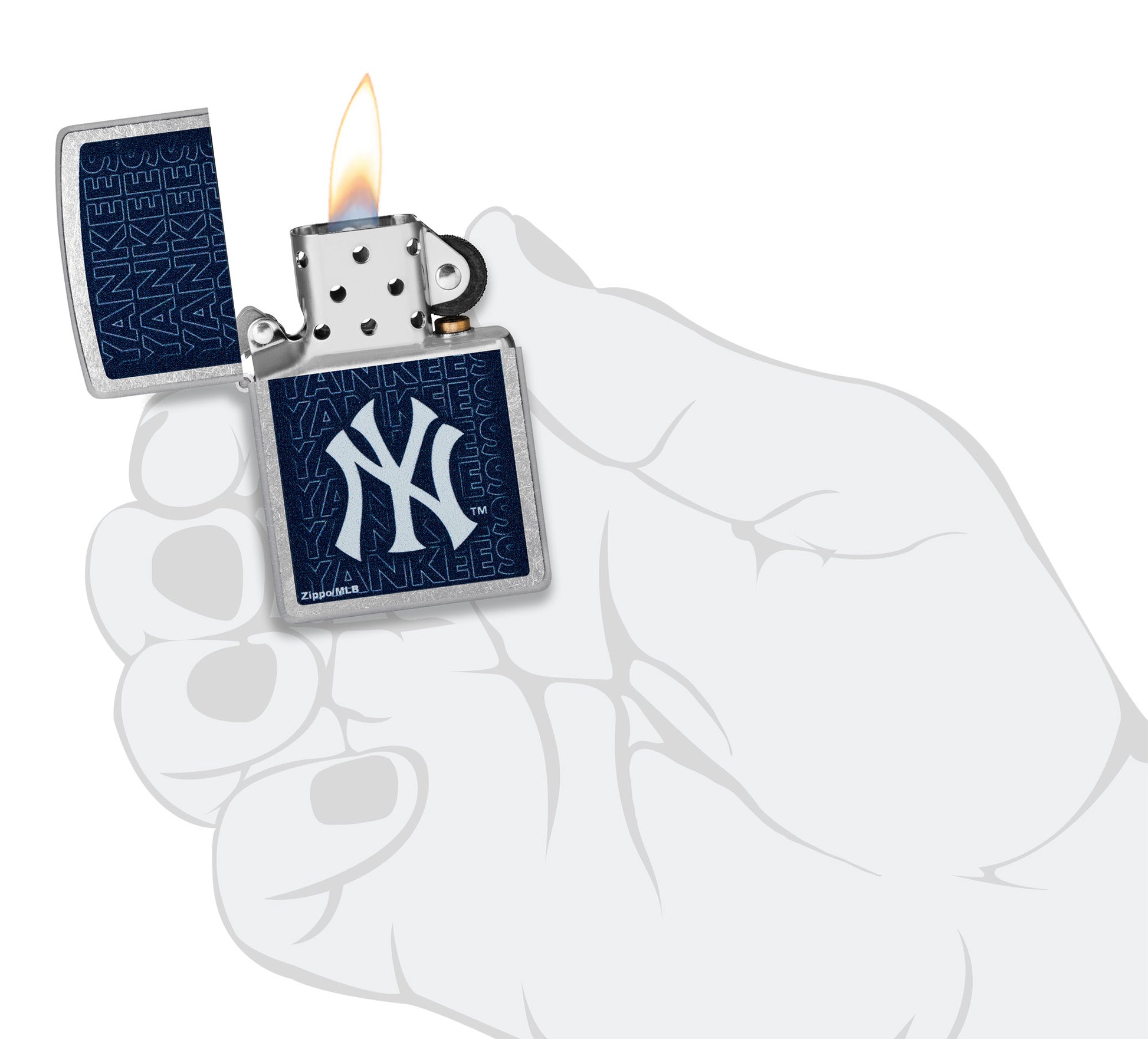 Zippo MLB® New York Yankees Street Chrome Windproof Lighter lit in hand.