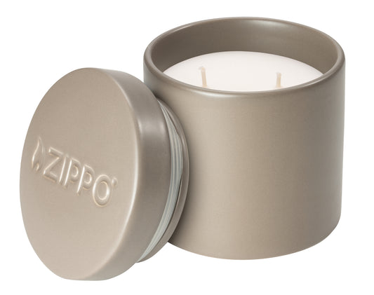 Front view of Zippo FlameScapes™ Citronella, Spearmint and Lemongrass Essential Oil Outdoor Candle unlit with the lid leaning against the candle.