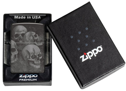 Zippo Skulls High Polish Black Windproof Lighter in its packaging.