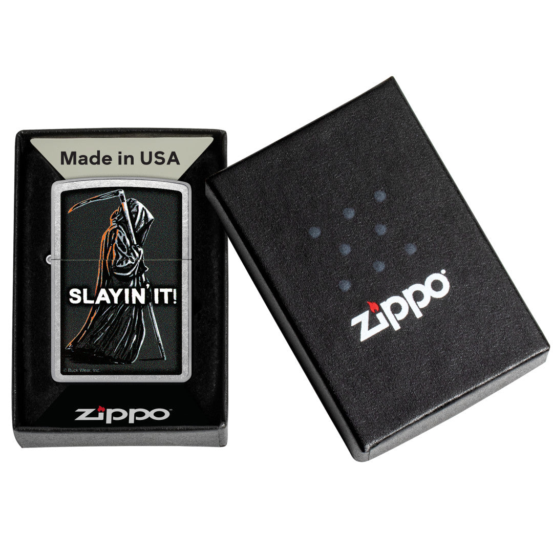 Zippo Buck Wear™ Slayin' It Design Street Chrome Windproof Lighter in its packaging.