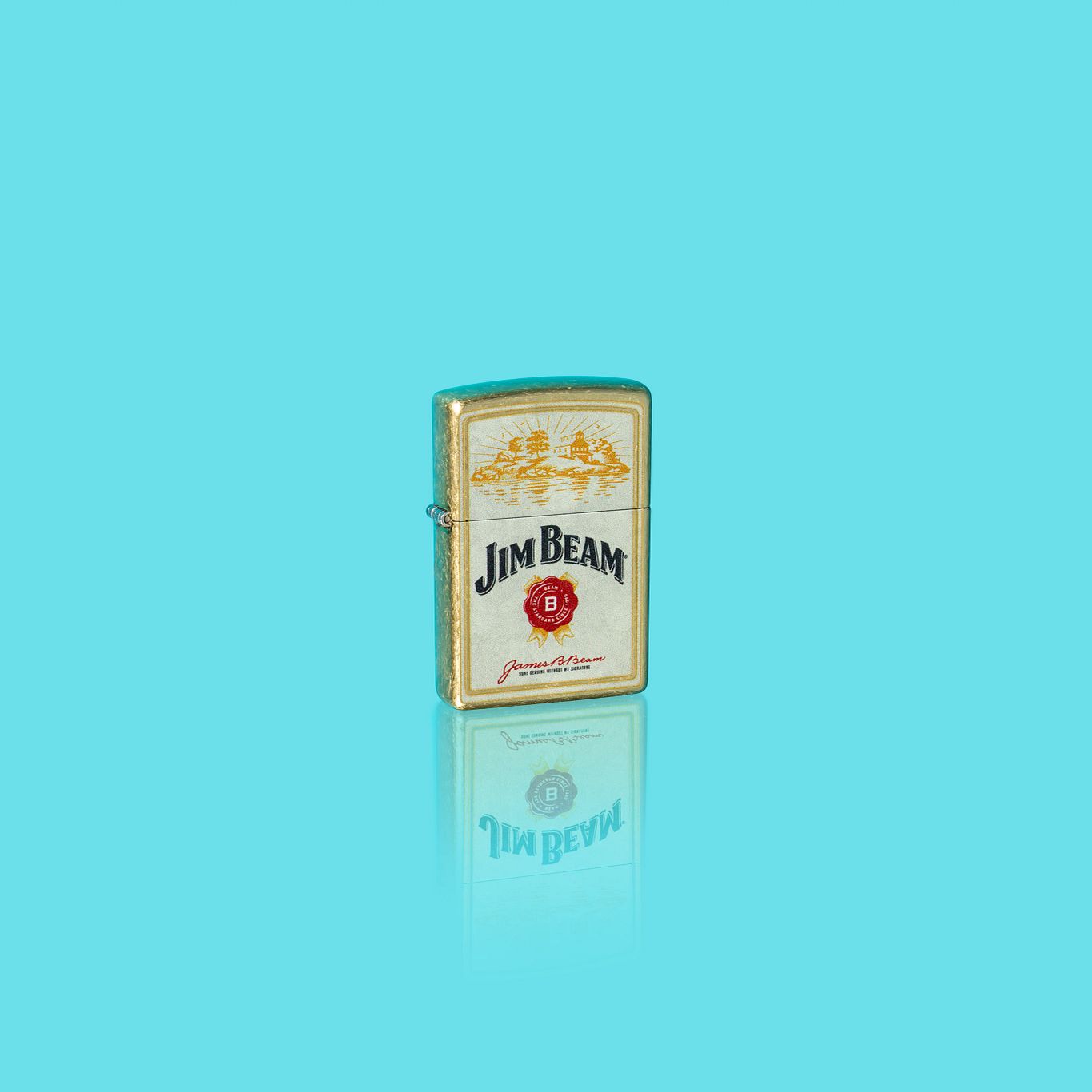 Lifestyle image of Zippo Jim Beam® Provenance Design Street Brass Windproof Lighter showing the front of the lighter with a light blue background. 

