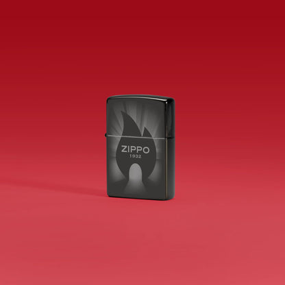 Lifestyle image of Zippo Radiant Zippo Design High Polish Black Windproof Lighter standing in a red scene.