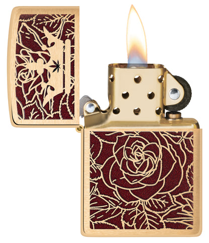 Zippo Queen of Bud Rose and Crown Design Brushed Brass Windproof Lighter with its lid open and lit.