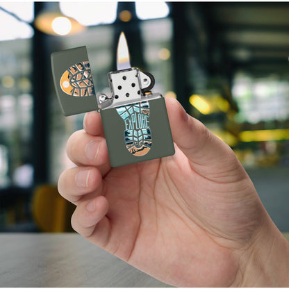 Zippo Step Out Design Green Matte Windproof Lighter lit in hand.