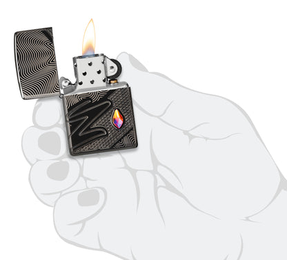 Zippo Z Crystal Design Armor® High Polish Black Windproof Lighter lit in hand.