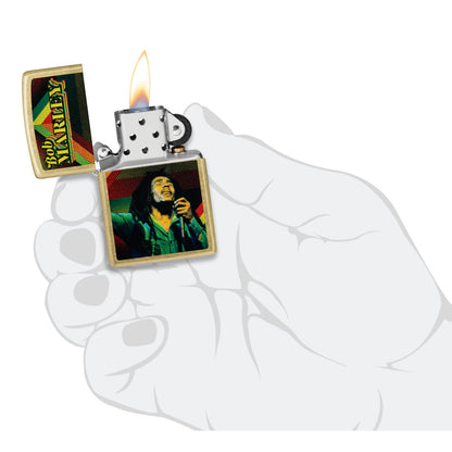 Zippo Bob Marley Soul Design Street Brass Windproof Lighter lit in hand.