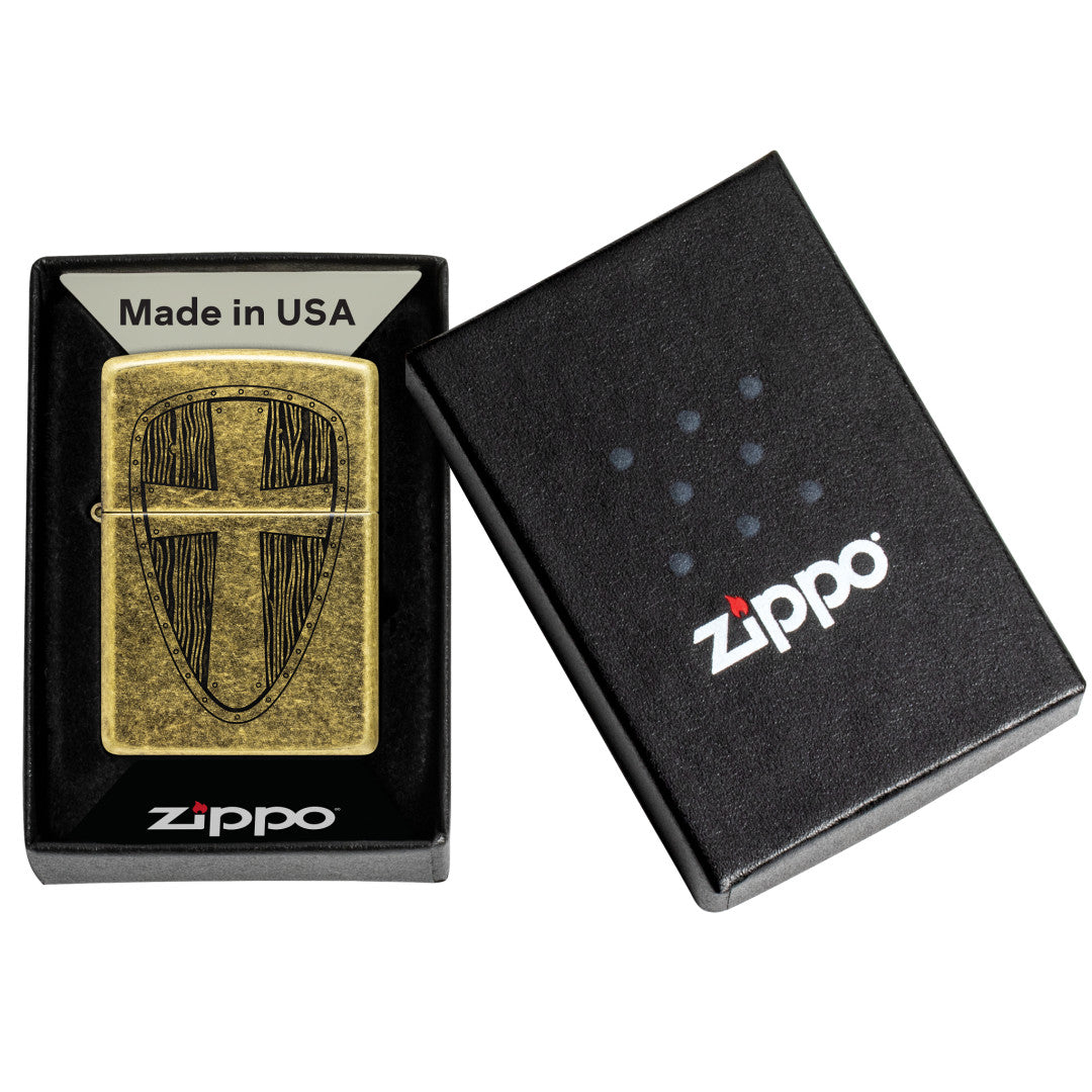 Zippo Medieval Shield Design Antique Brass Windproof Lighter in its packaging.
