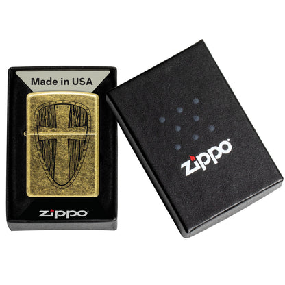 Zippo Medieval Shield Design Antique Brass Windproof Lighter in its packaging.