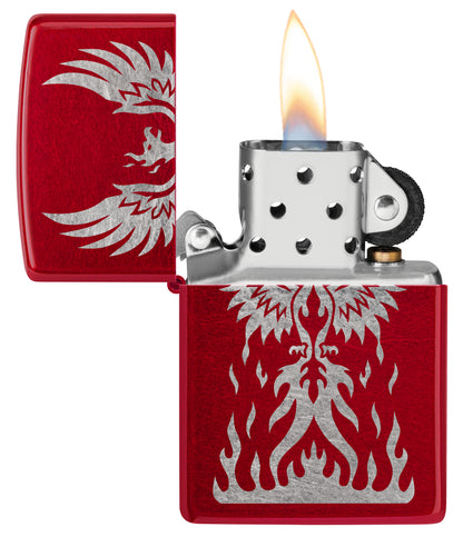 Zippo Phoenix Rising Design Candy Apple Red Windproof Lighter with its lid open and lit.