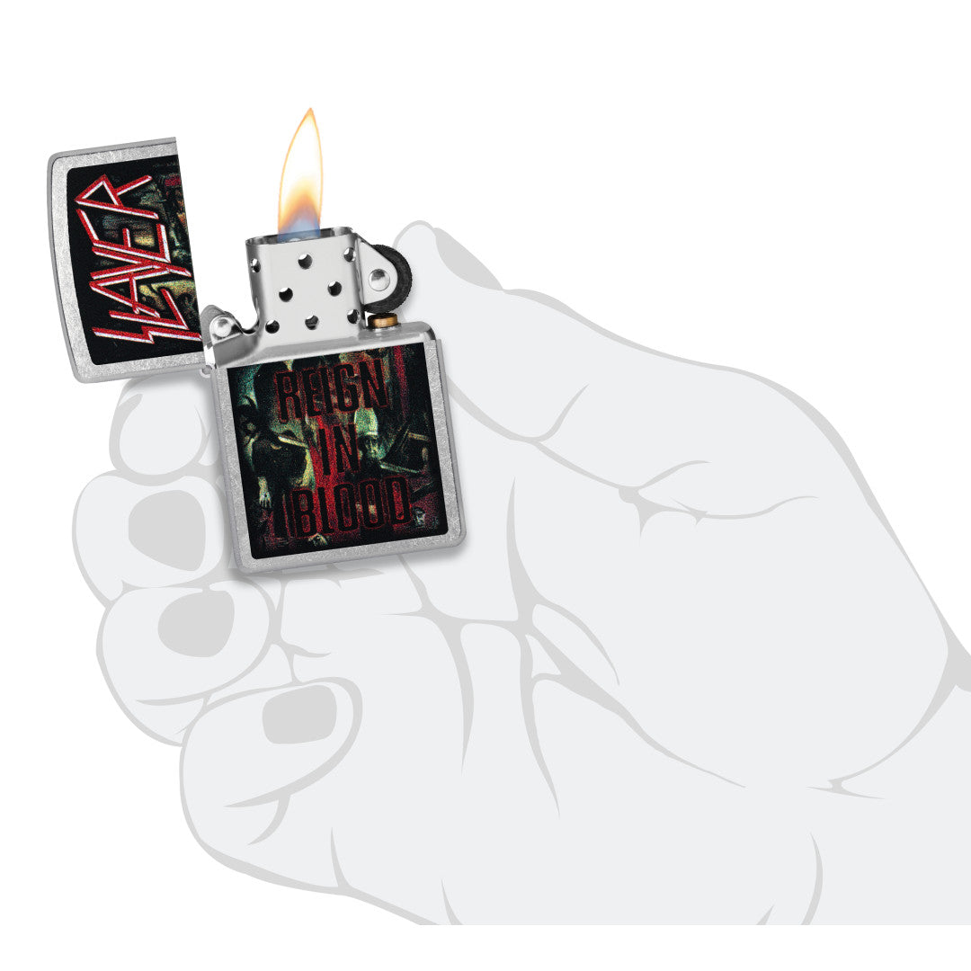 Zippo Slayer Reign in Blood Design Street Chrome Windproof Lighter lit in hand.