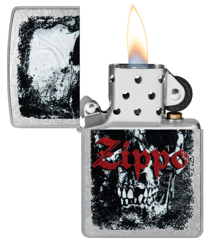 Zippo Skull Design Street Chrome Windproof Lighter with its lid open and lit.