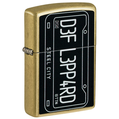 Front shot of Zippo Def Leppard Steel City Design Street Brass Windproof Lighter standing at a 3/4 angle.