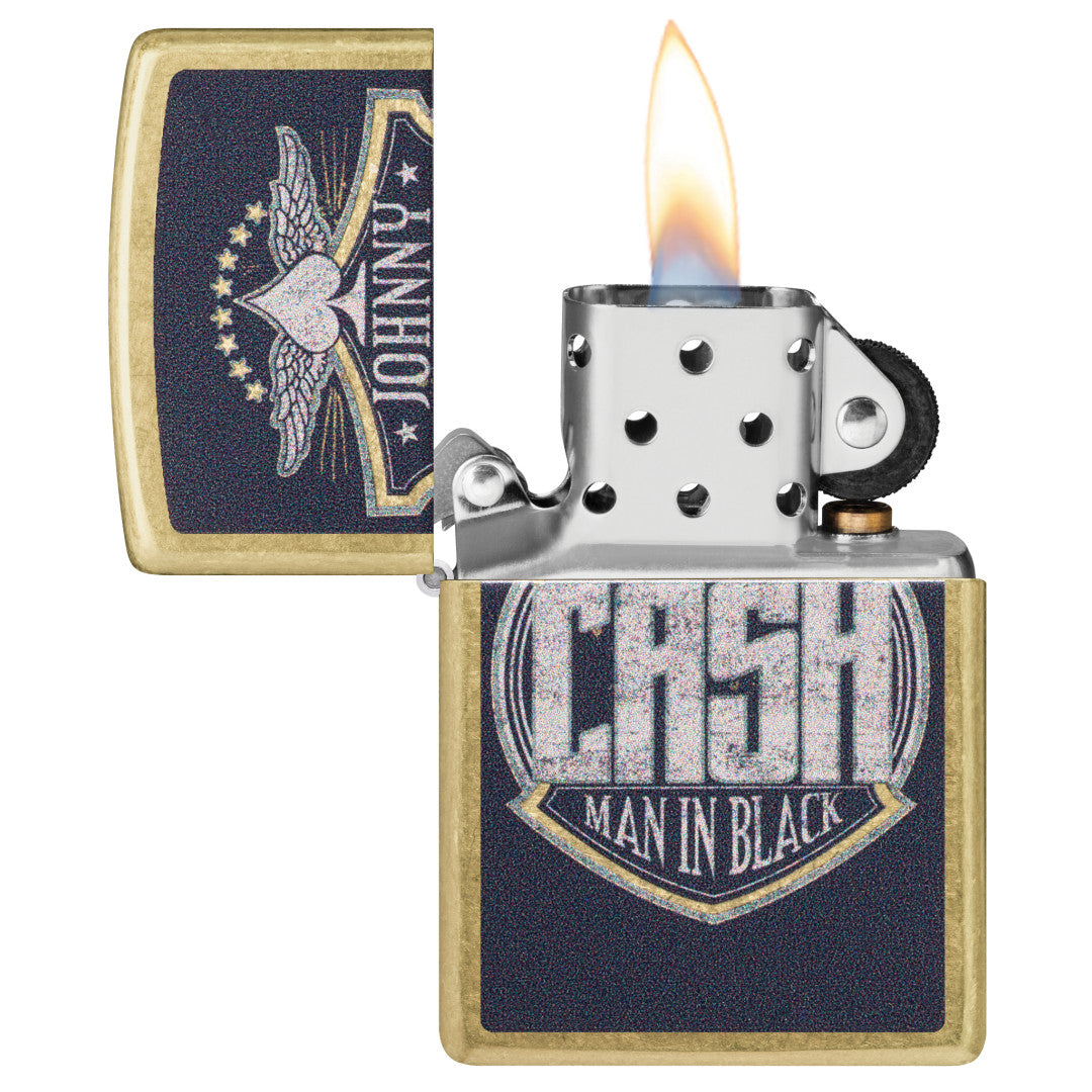 Zippo Johnny Cash Crest Design Street Brass Windproof Lighter with its lid open and lit.
